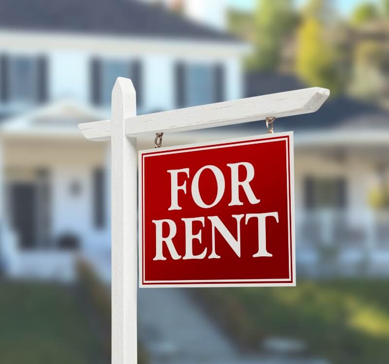 for rent sign in front of house